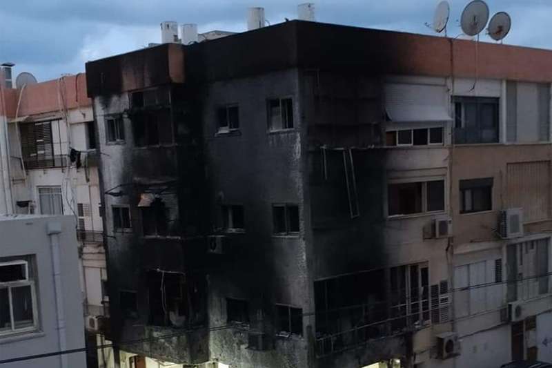 הבניין שעלה באש ברחוב הגעתון | צילום: משטרת ישראל
